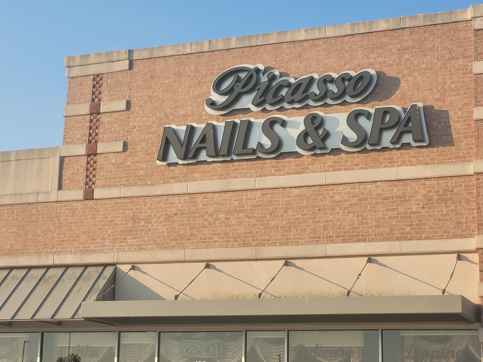 Picasso of Main Nails & Spa nail work in Frisco, Texas